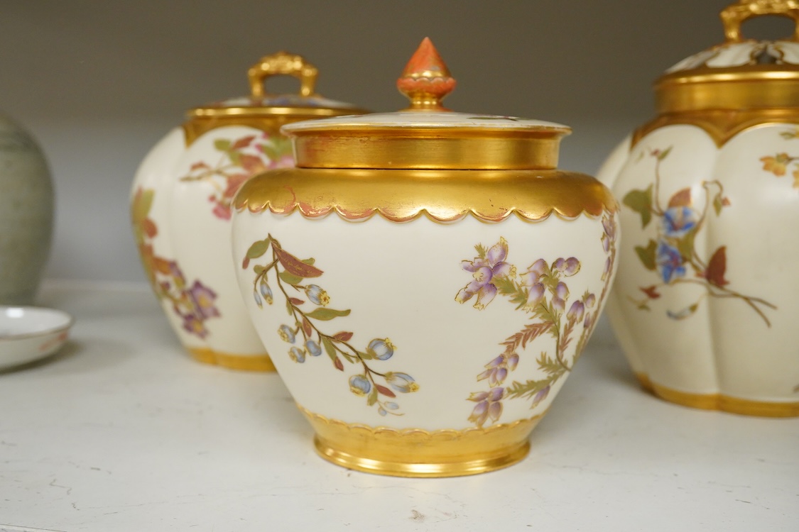 Three 19th century Worcester blush ivory potpourri or biscuit jars and covers, two with liners, each decorated with flowers and buds, largest 20cm high